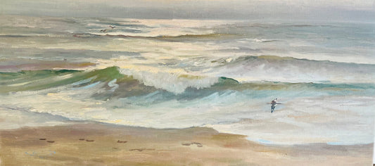 An impressionistic painting of ocean waves rolling onto a sandy beach, with a small surfer figure near the right side of the water.